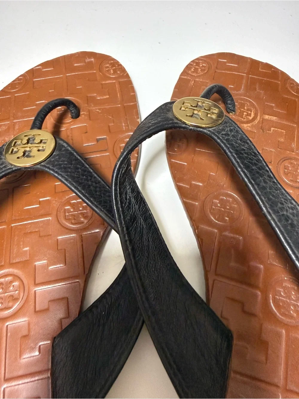 Tory Burch Black Leather and Brown Rubber Logo Flip Flop Sandals